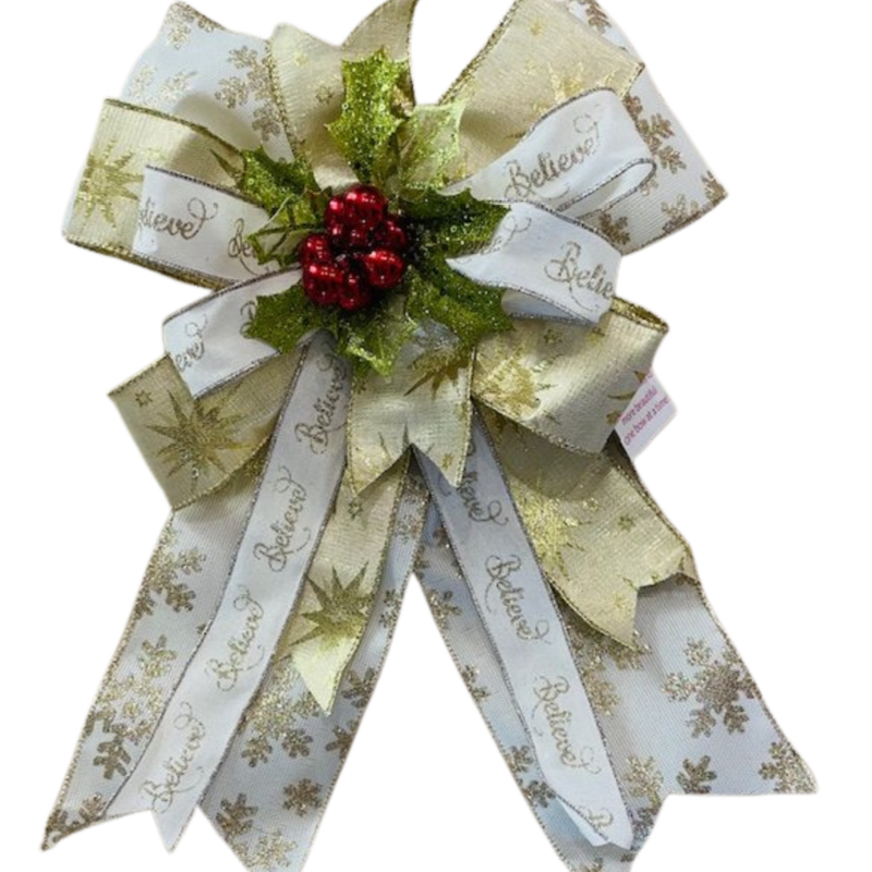 INDIA – A deluxe Christmas bow, 14" by 16", designed in white and gold for a simple yet stunning winter glow.
